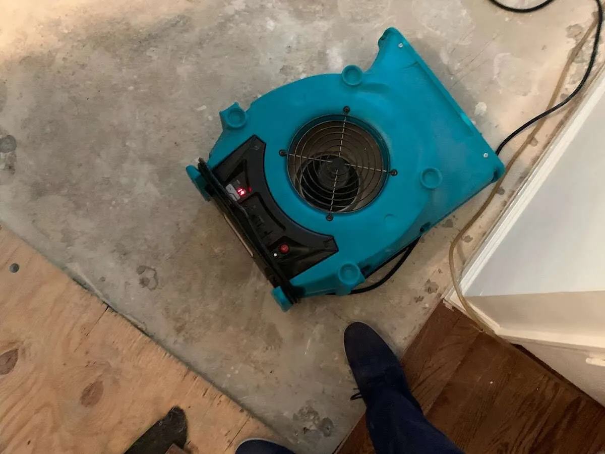 Air mover drying subfloor during Leak Detection & Repair in Richland